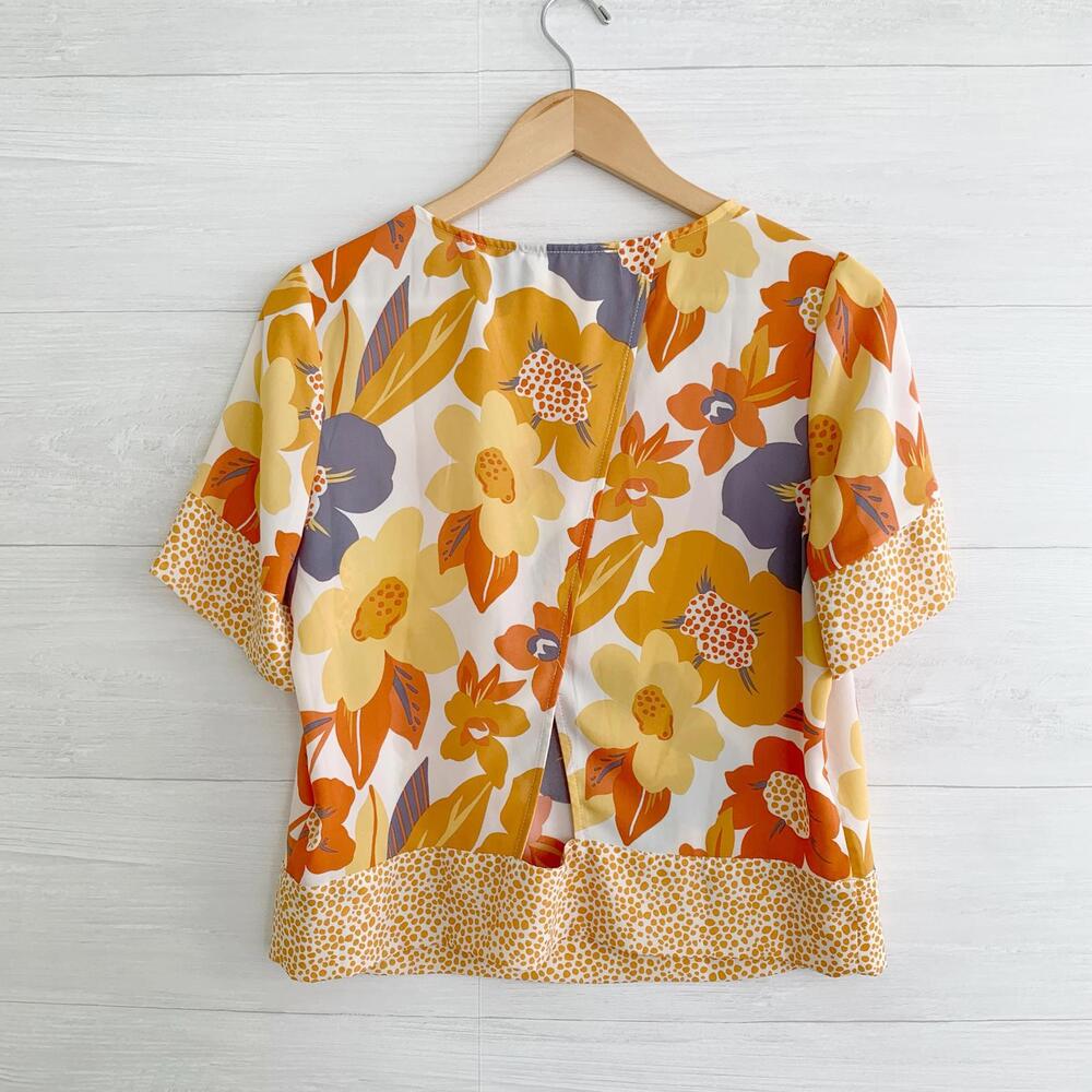DR2 - Orange floral short sleeve cut out tulip back chiffon top, S